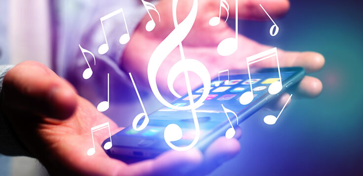 Concept of listenning music on a device - Technology concept