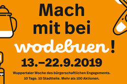 Werbeplakat mit senffarbenem Hintergrund, darauf steht in schwarzer Schrift: Mach mit bei wodebuen! 13. bis 22. September 2019 - Wuppertaler Woche des bürgerschaftlichen Engagements. 10 Tage, 10 Stadtteile, mehr als 100 Aktionen.