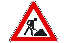 Ein Baustellen-Schild mit rotem Dreieck und stilisiertem Arbeiter