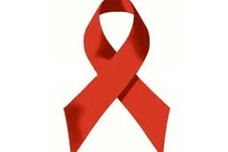 Das Bild zeigt die rote Schleife, die für Solidarität steht